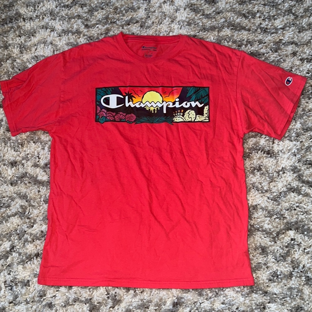 Men’s red Champion tee.